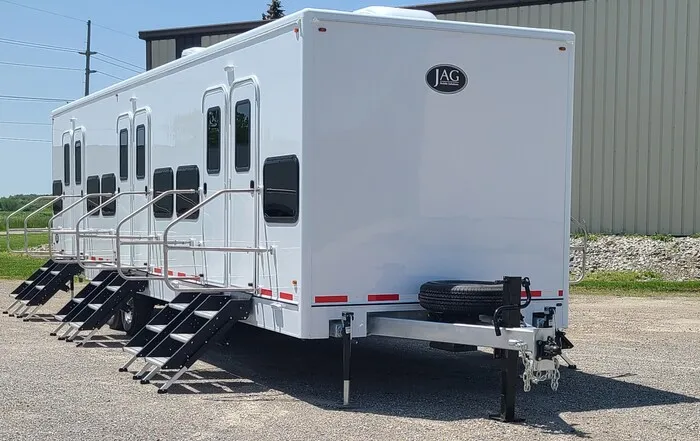 Bunkhouse Sleeper Trailer for Texas Rural Use. Bunkhouse sleeper trailer rental from The Lavatory Texas fleet