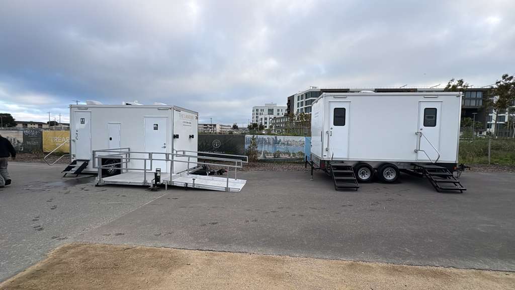 Texas construction site portable restroom trailer rental. Luxury jobsite bathroom trailer for crew use